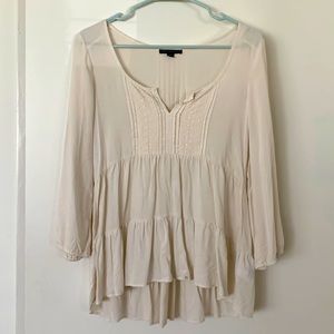 Trapeze cream high low top. Size small